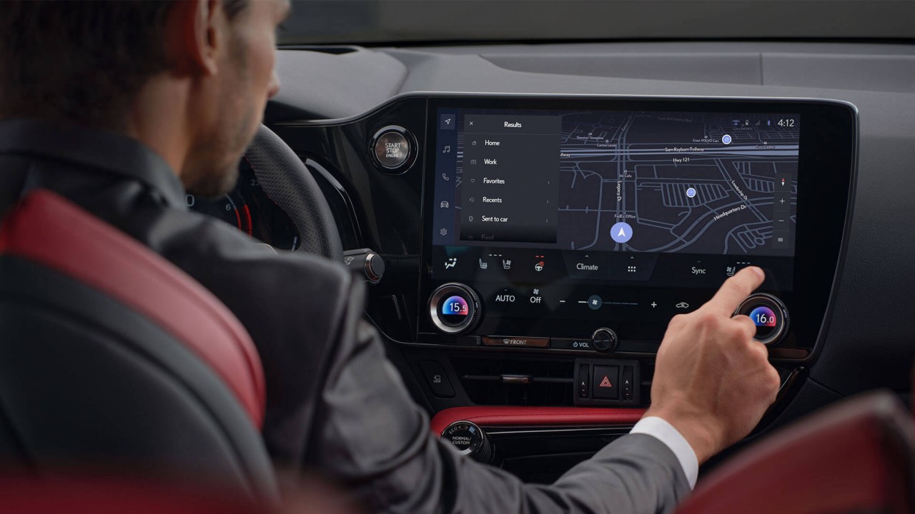 Man interacting with the Lexus' interface